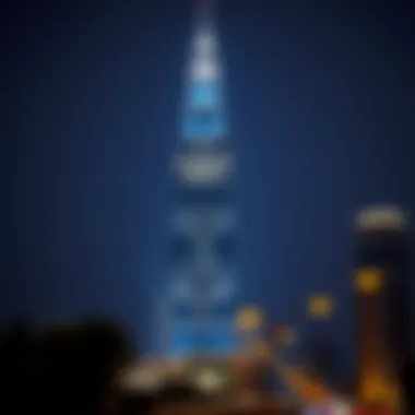 City Gate Tower: A Beacon of Light in Dubai Night view of City Gate Tower illuminated against the city lights