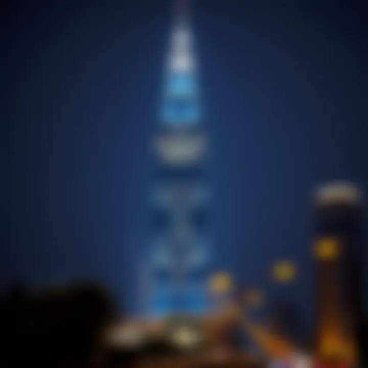 City Gate Tower: A Beacon of Light in Dubai Night view of City Gate Tower illuminated against the city lights