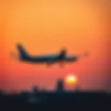 Airplane taking off against a sunset