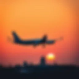 Airplane taking off against a sunset