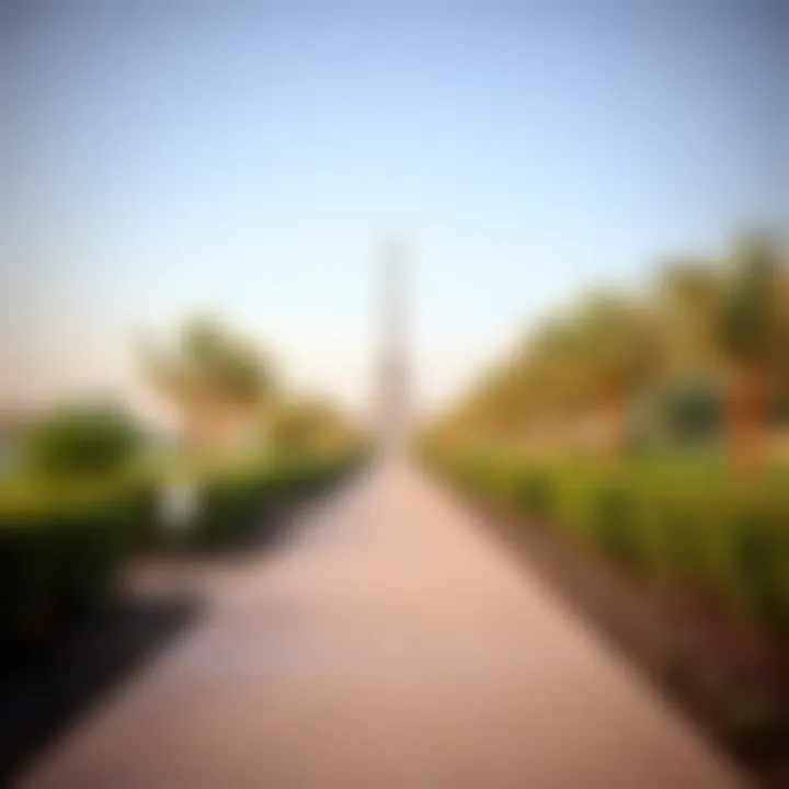 Serene Walking Path in Wasl Green Park A serene walking path in Wasl Green Park lined with trees and greenery